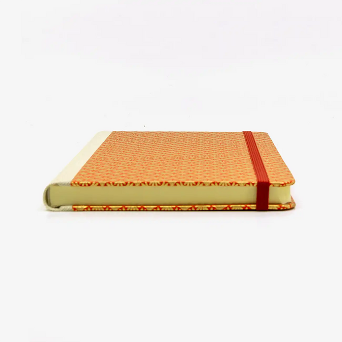 A5-dotted-small-chiyogami-cover-motiv-Ornament-gold-auf-rot-liegend-vorn