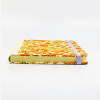 A5-dotted-small-chiyogami-cover-motiv-Sakura-auf-goldenen-Wolken-liegend-vorn