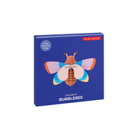 Studio-Roof-Ornament-3d-Object-Lucky-charms-bumble-bee-Verpackung-1
