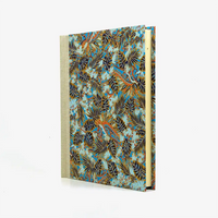 Fotoalbum-24x20cm-60Seiten-creme-Fotokarton-Cover-Chiyogami-Motiv-Monstera-blau-seitlich-von-vorn