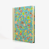 Fotoalbum-24x20cm-60Seiten-creme-Fotokarton-Cover-Katazome-shi-Motiv-Blumenornament-blau-seitlich-von-vorn