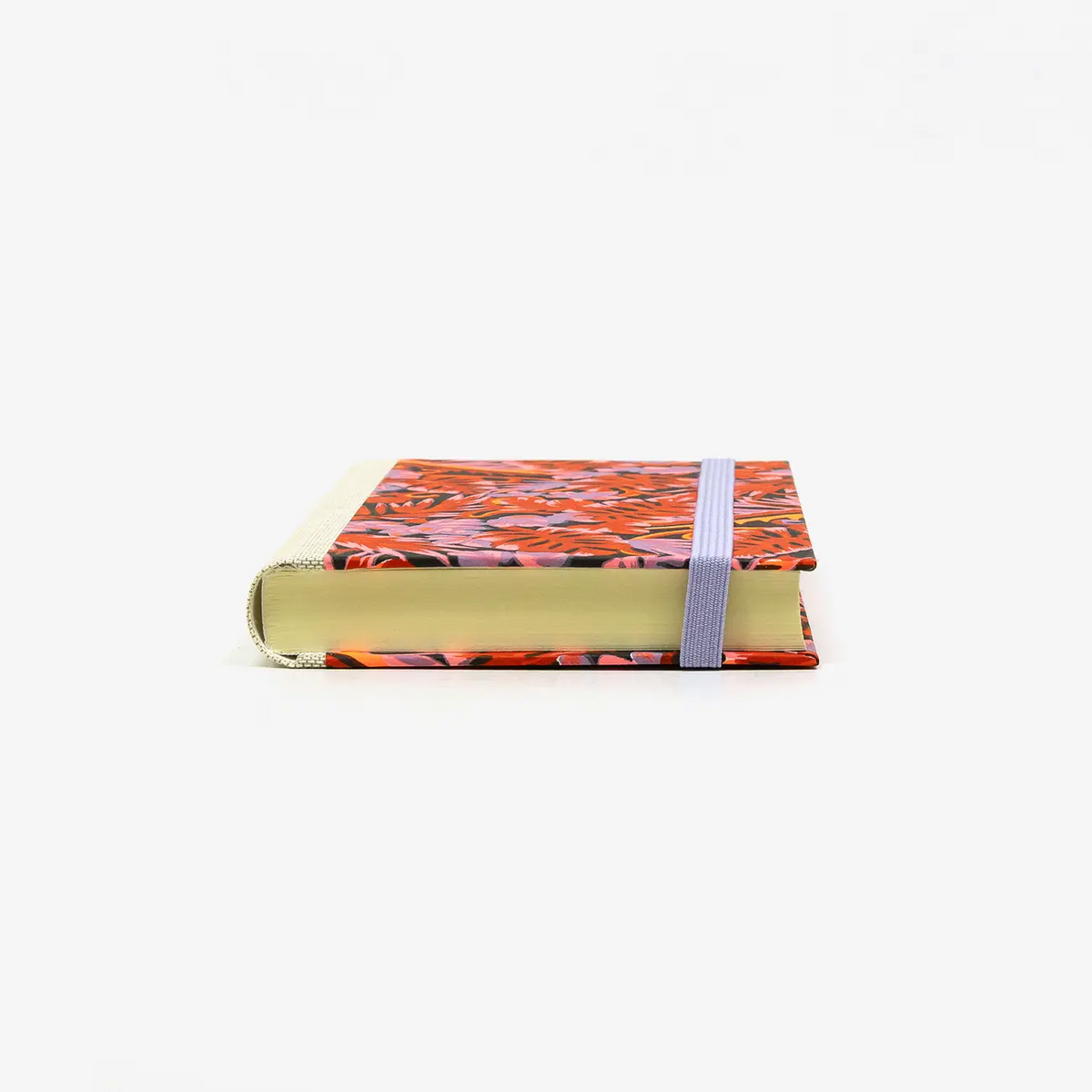 Notizbuch-blanko-9x14cm-224seiten-cover-mit-chiyogami-Motiv-Monstera-rot-liegend-vorn