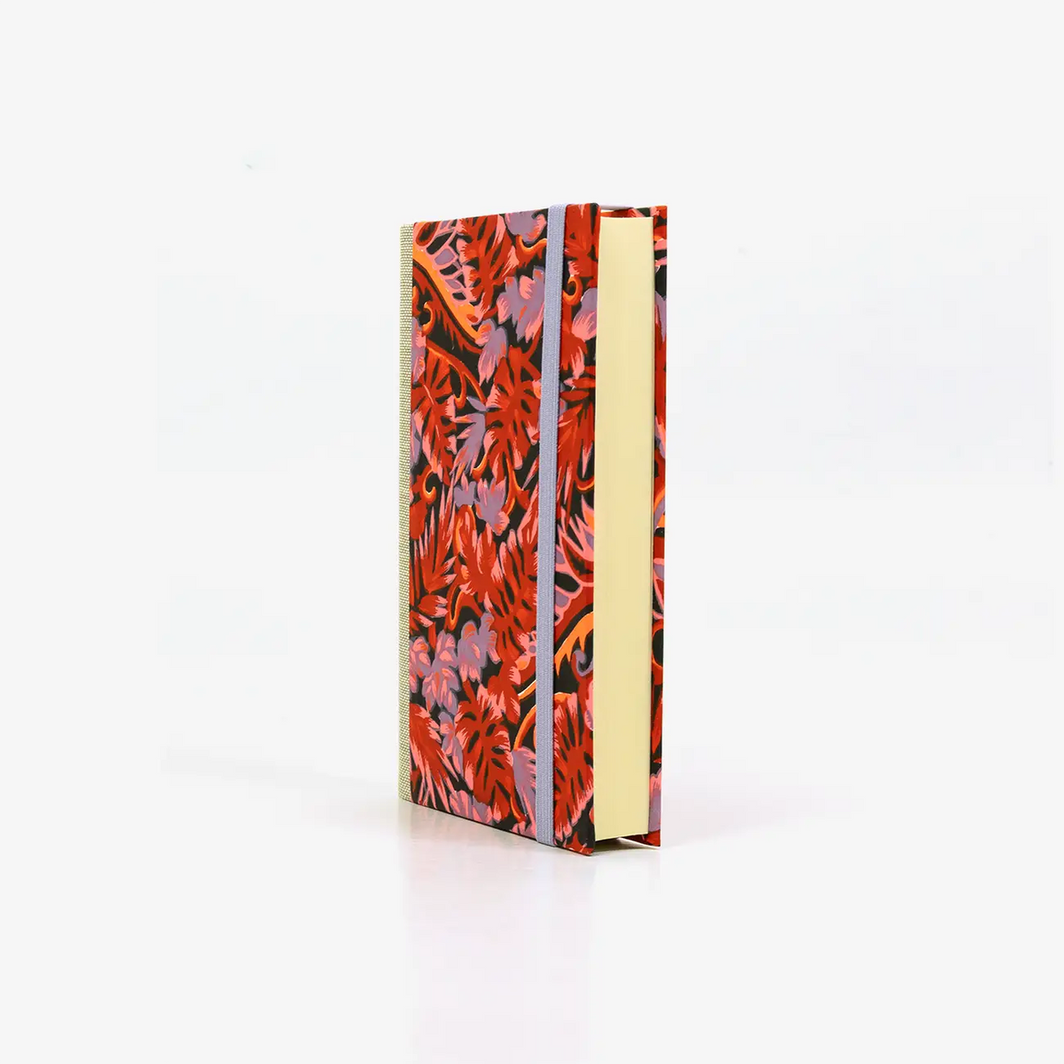Notizbuch-blanko-9x14cm-224seiten-cover-mit-chiyogami-Motiv-Monstera-rot-seitlich-vorn