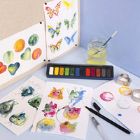 creativ-Company-Aquarell-Set-Standartfarben-hochpigmentiert-Metallbox-mit-Pinsel-_-Mischpalette-12Farben-Beispielbild