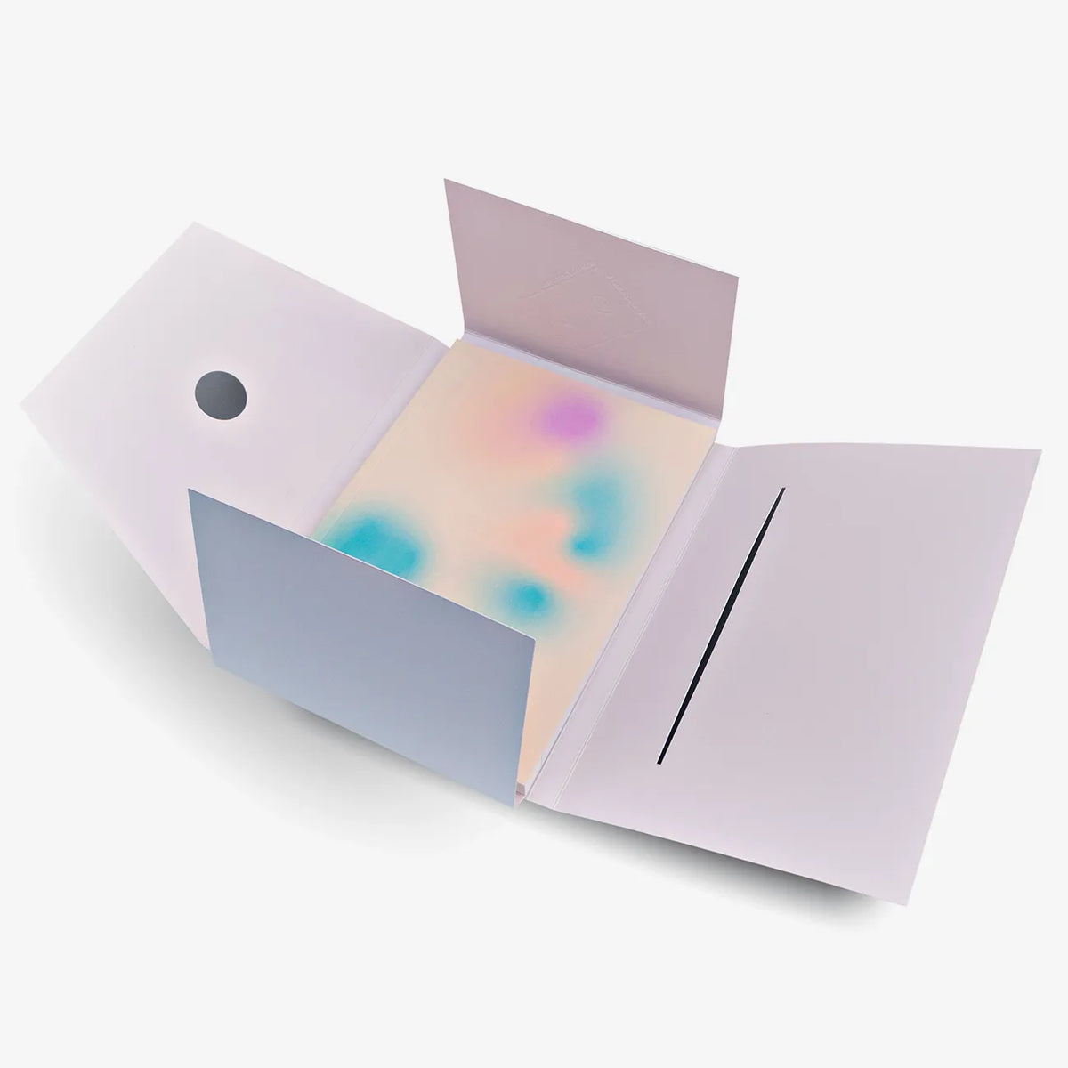 the-completist-notizbuch-notebook-gradient-a5-dotted-softcover-Cover-Vorn-in-Verpackung