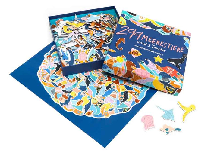 LAurence-King-Verlag-299-Meerestiere-und-1Taucher-Puzzle-box-Verpackung-oben-geöffnet+Puzzleteile-Inhalt